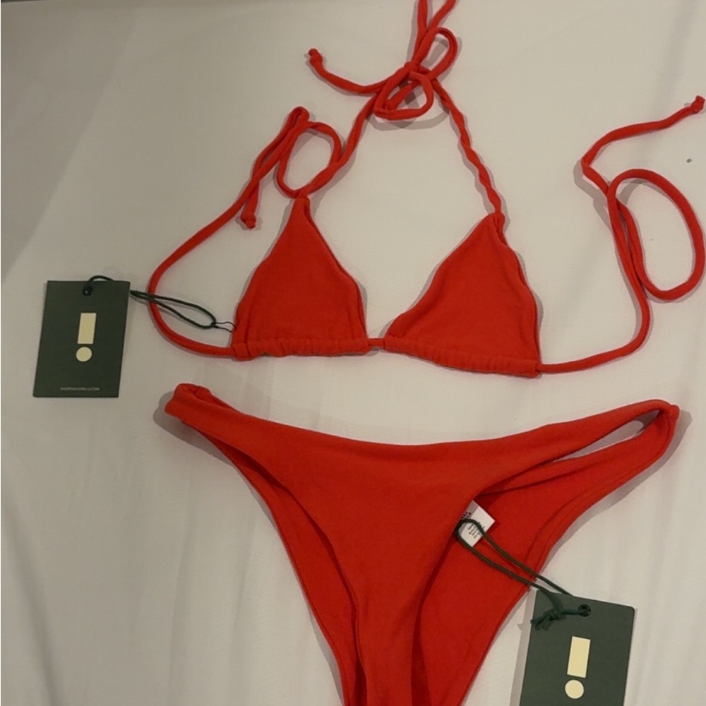 Daily Drills Swimsuit NWT Top is xs and bottoms are small